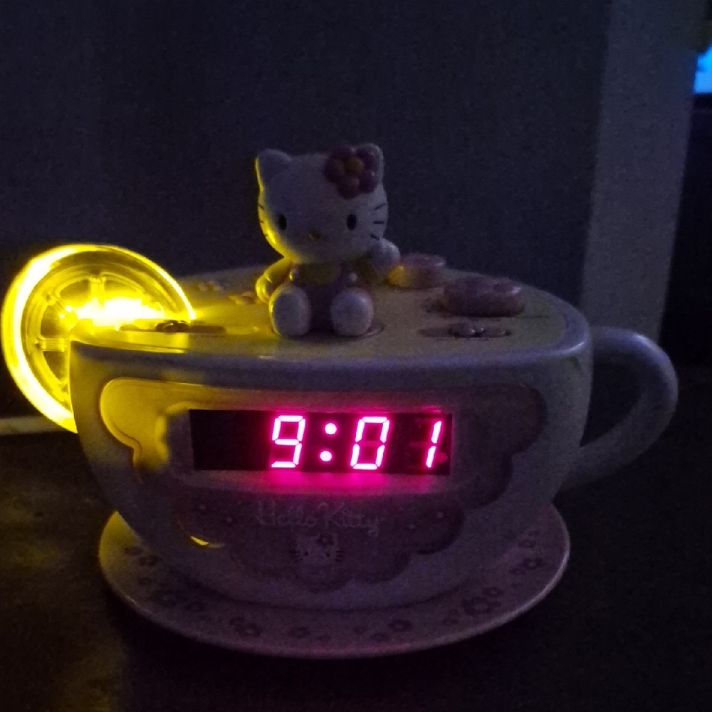 Hello Kitty Pink and White Teacup Clock with Yellow Accent With Night Light - Picture 2 of 4